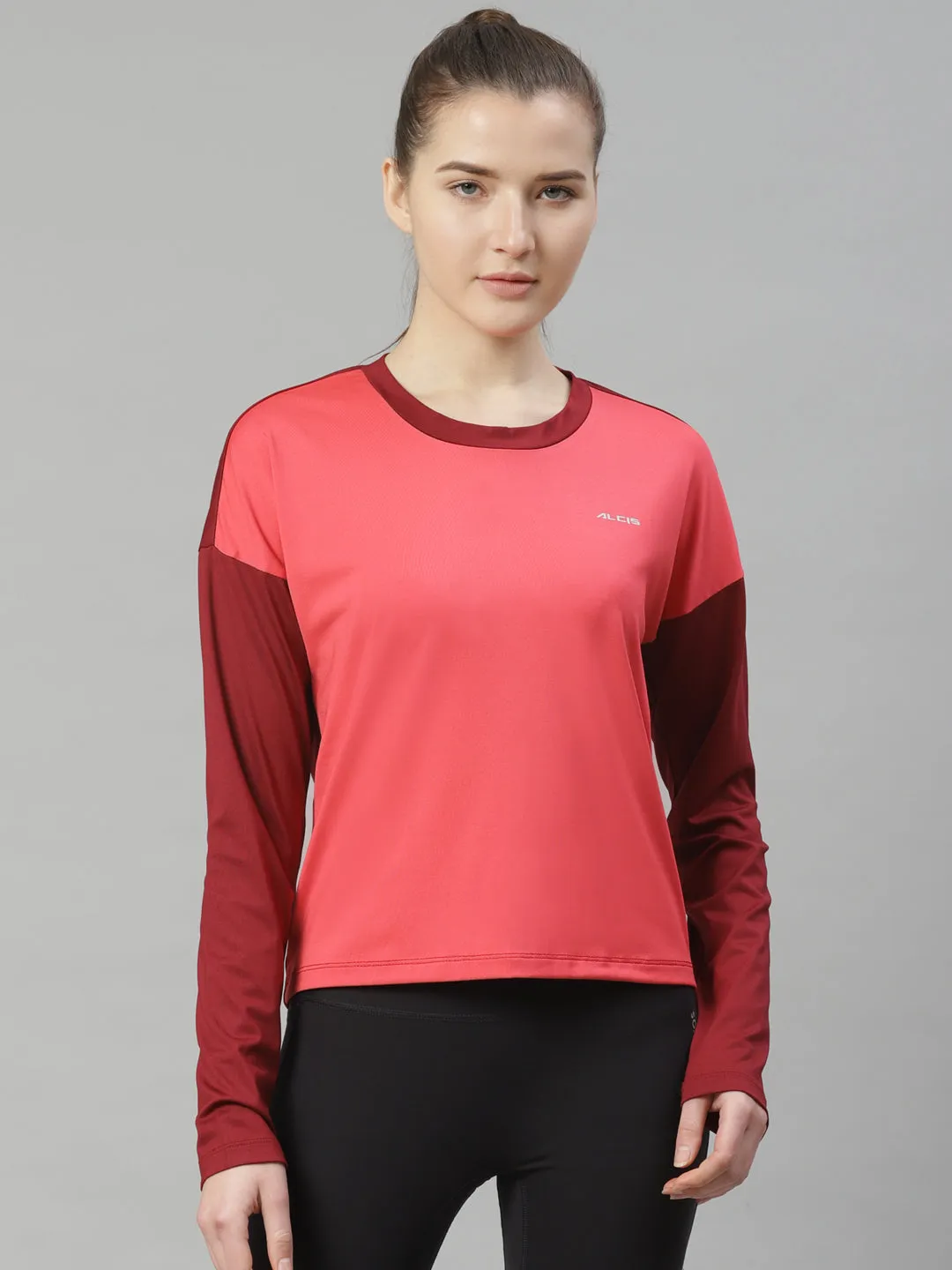 Alcis Women Coral Pink Solid Slim Fit Round Neck T-shirt