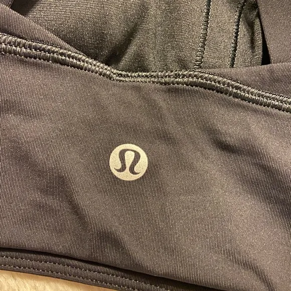 Like new LuluLemon Free to be moved black padded sports bra size 4