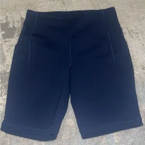 Lululemon Athletica Train High rise shorts with pockets color navy